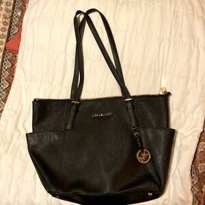 Michael Kors traditional black leather tote.